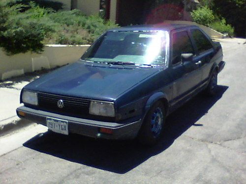 Mk2 2door wolfberg munsee 5spd tinted 13" rims lowered 6" weber carb 50mpg