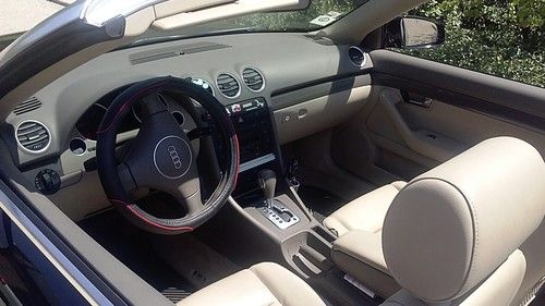 Audi a4 \\ 2004 \\ black convertible 1.8 liter turbo