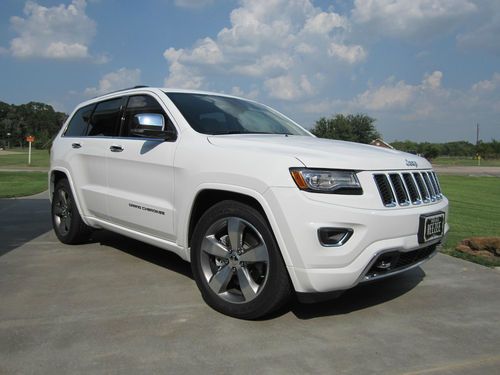 2014 overland 4x4 grand cherokee 4k miles panoramic roof, air ride, cooled seats