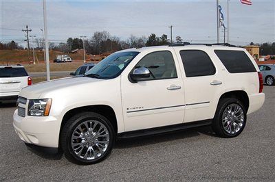 Save at empire chevy on this loaded white diamond ltz 4x4 with factory 22s