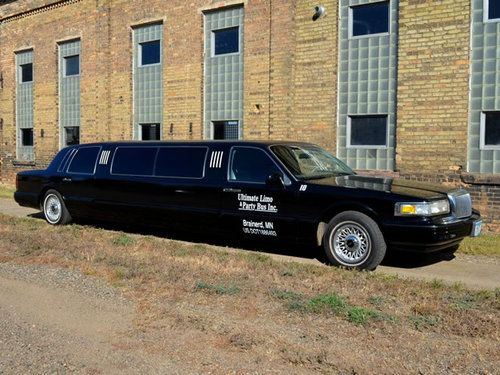 1995 black lincoln town car with all new interior, new tires and new paint job