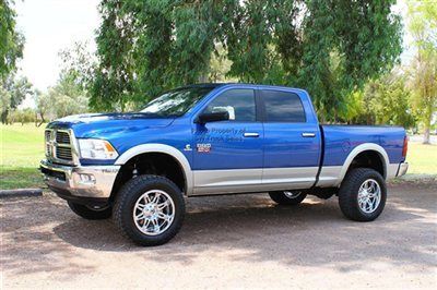 Beautiful blue lifted cummins diesel 4x4 navigation leather heated/cooled seats