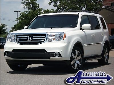 Pearl white, 4wd, navigation, dvd system, tow package @ accurate cars nashville