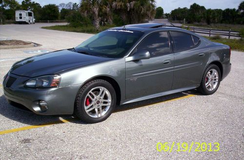 29,600 origonal miles, supercharged gtp 4dr sedan with competition group package