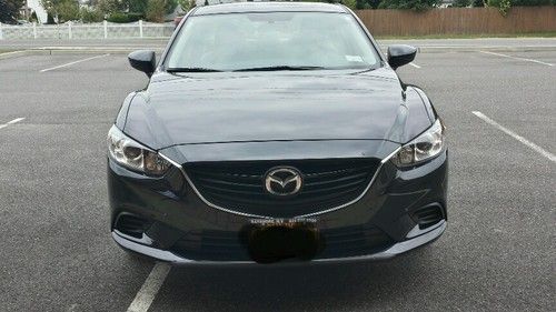 2014 mazda6 touring edition black with leather interior it has only 1575 miles