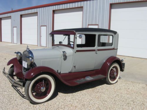 1929 ford model a two-door sedan with after market dash fan