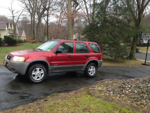 Red 2001 ford escape - good condition - as is
