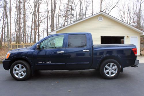Beautiful metalic navy blue exterior. excellent condition, kept in a garage.
