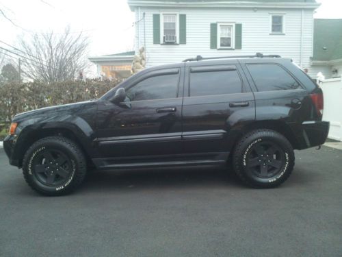 2008 jeep grand cherokee, lifted, bf goodrich tires, warranty!!