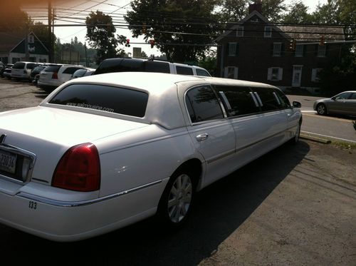 White 120" stretch limousine by krystal koach