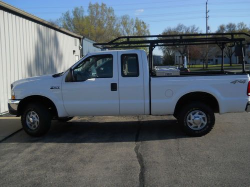 4-door extended cab 4wd super duty pickup truck, excellent condition