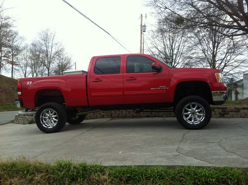 2008 2500 hd gmc pick up, red in color crew cab