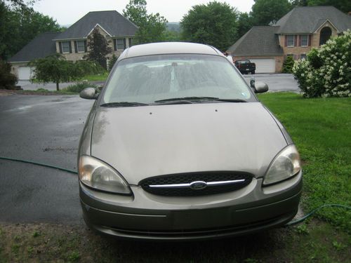 Gray 2002 ford taurus ses 4 door. runs very well,great price,must see.