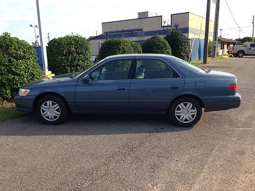 165k miles.  great condition.  it is a bluish green color.