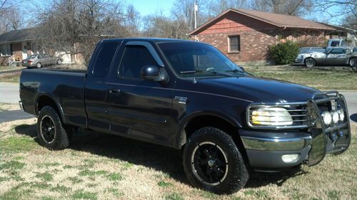 99 ford f150 lariat, 5.4 triton v8, 4x4, extended cab, new rims/tires no reserve