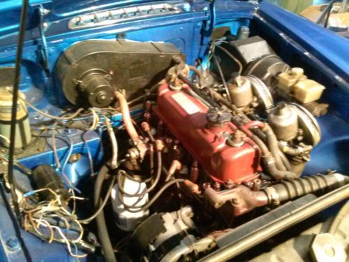 1963 mgb roadster,bright blue,older restoration,nice driver,needs misc work