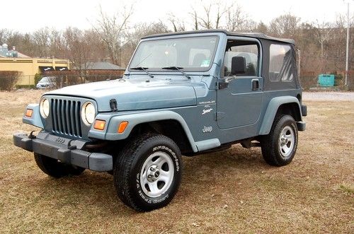 1998 jeep wrangler sport, 4.0 liter 6 cylinder, 5 speed manual trans, a.c. p.s.