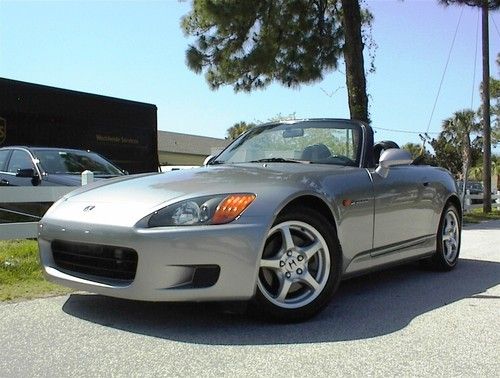 2000 honda s2000 roadster, 6 speed, convertible low miles, silver, blk, leather.