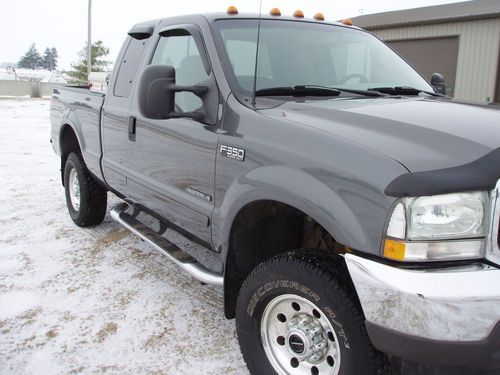 2003 ford f350 xlt 4x 4, automatic, 7.3 diesel, extended cab, gray/gray