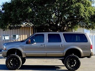 Ltd lifted fuel wheels leather 3 rows overhead dvd heated cruise a/c we finance