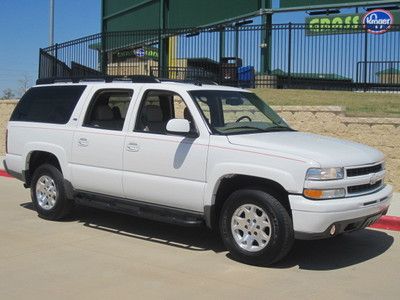 Look at this 2005 chevy suburban fully loaded ,navi,sunroof,with only 103k