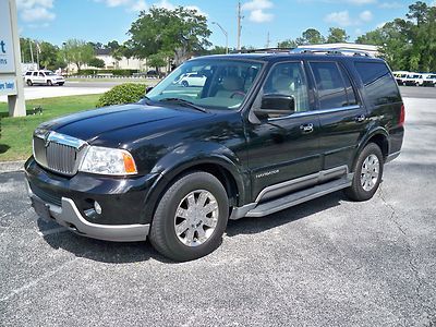 2004 lincoln navigator luxury pkg,4x4,snrf,pwr 3rd row,dvd,heated/cooled seats