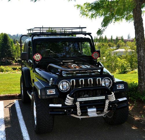 2000 jeep wrangler tj sport 4.0l/5spd,black,cold ac,lifted,low miles/tow vehicle