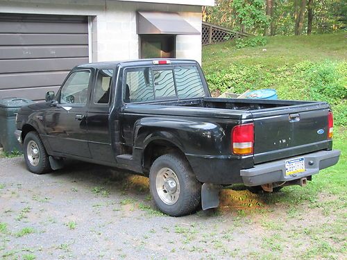 1996 ford ranger,extended cab, short bed, black.
