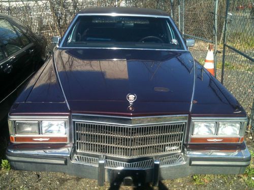 1989 cadillac brougham sedan with formal full padded roof