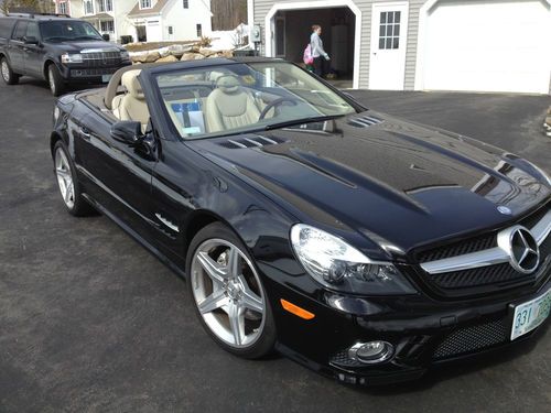 2009 sl 550 conv.  29000 miles, mint condition, extended warranty to oct 2015