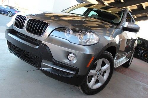 2008 bmw x5. premium pkg. nav. camera. roof. rare 3 rd row seat. like new in/out