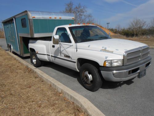 Dodge cummins dually pickup truck with 24-foot aluminum gooseneck vendor trailer