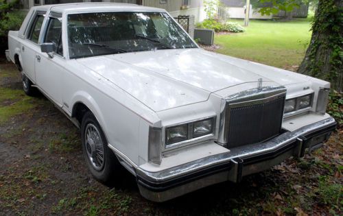1983 lincoln town car-lewes delaware, not holding water