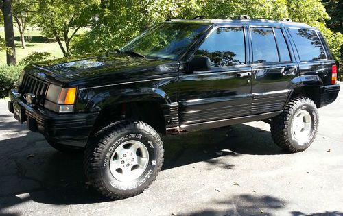 1995 jeep grand cherokee limited, 5.2l, lifted, 32" tires