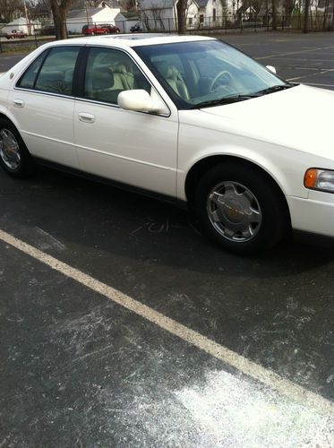 Cadillac seville sls, beautiful,but needs work,bad head gasket.mechanic special