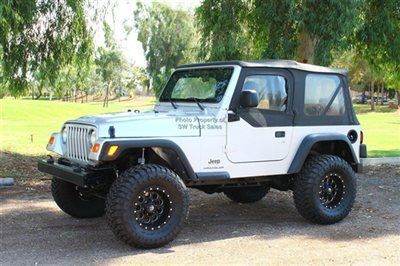 Low miles lifted 5 speed soft top 4x4 suv cold a/c, fuel wheels - we finance!
