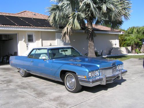 1973 cadillac  coupe de ville baby blue with white leather interior