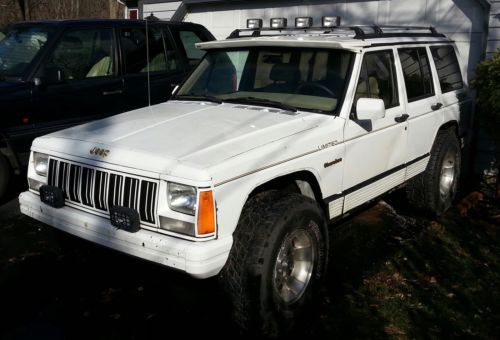 1991 jeep cherokee limited leather power seats, windows, 4.0 big tires low miles
