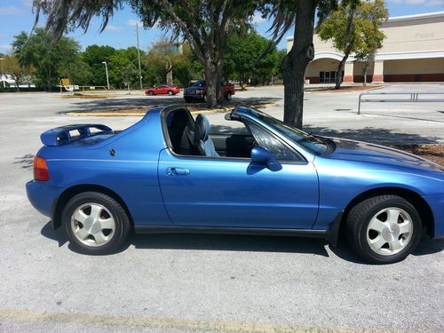 Gorgeous del sol ,1.6  5spd. cold ac up to 41 mpg runs great &amp; looks great ..