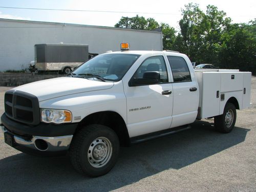 Single owner utility truck 4x4 crew cab 5.7 litre hemi stahl work bed