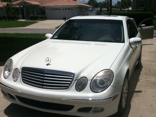 Mercedes benz, e-320, 2003, white, sun roof, c.d. changer, 95,000 mi. abs brake.