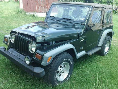 No reserve 1997 jeep wrangler sport 4.0l 5 speed wrecked rebuildable salvage