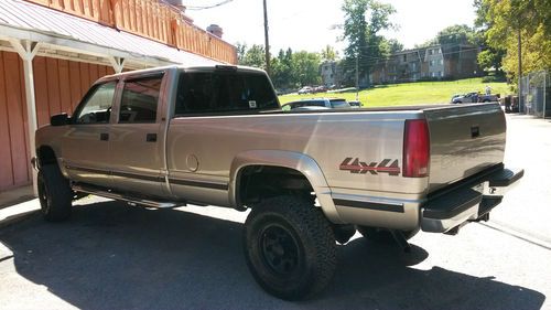 Chevy 3500 pick up  4x4  4 doors  long box  165k excelent condition  lift 4"