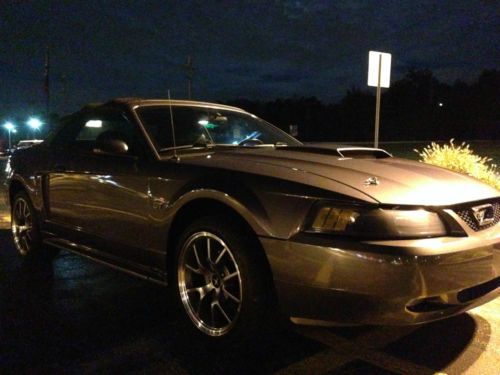 2003 ford mustang gt convertible, gray lot of extras. nice fun car!!