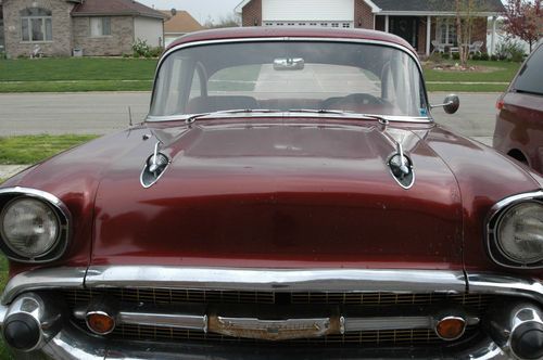 1957 chevy bel air, maroon color, 2-door hardtop, fair condition