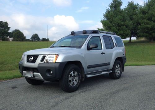 Like new 2013 nissan xterra pro-4x suv. gray color. excellent condition!