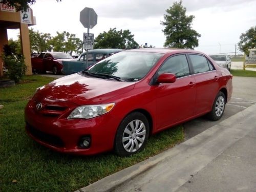 2013 red toyota corolla le: only 14k miles, clean title, mp3, cruise ctrl