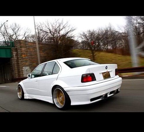 White supercharged bmw