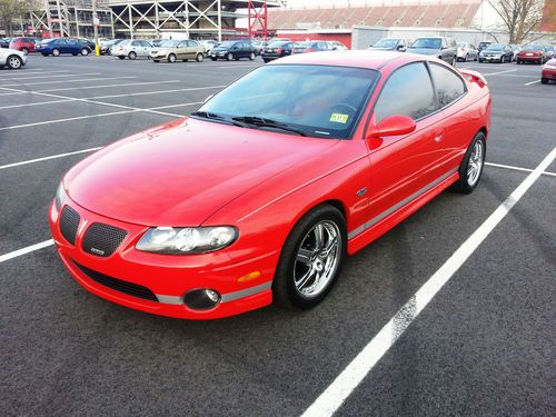 2004 pontiac gto base coupe 2-door 5.7l. no reserve. red/red. 5.7 litre ls-1.