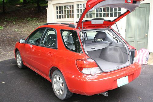 Red all wheel drive subaru impreza, wagon, auto, alloy rims, good condition